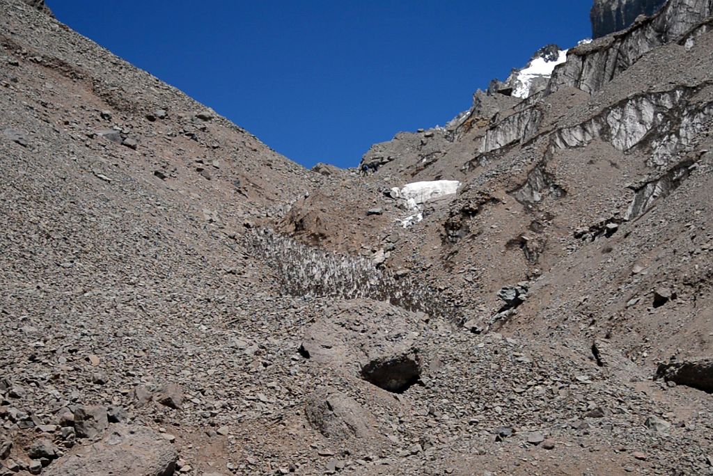 06 The Trail Steepens As It Ascends A Narrow Gully Passing Small Ice Penitentes On The Climb From Plaza Argentina Base Camp To Camp 1